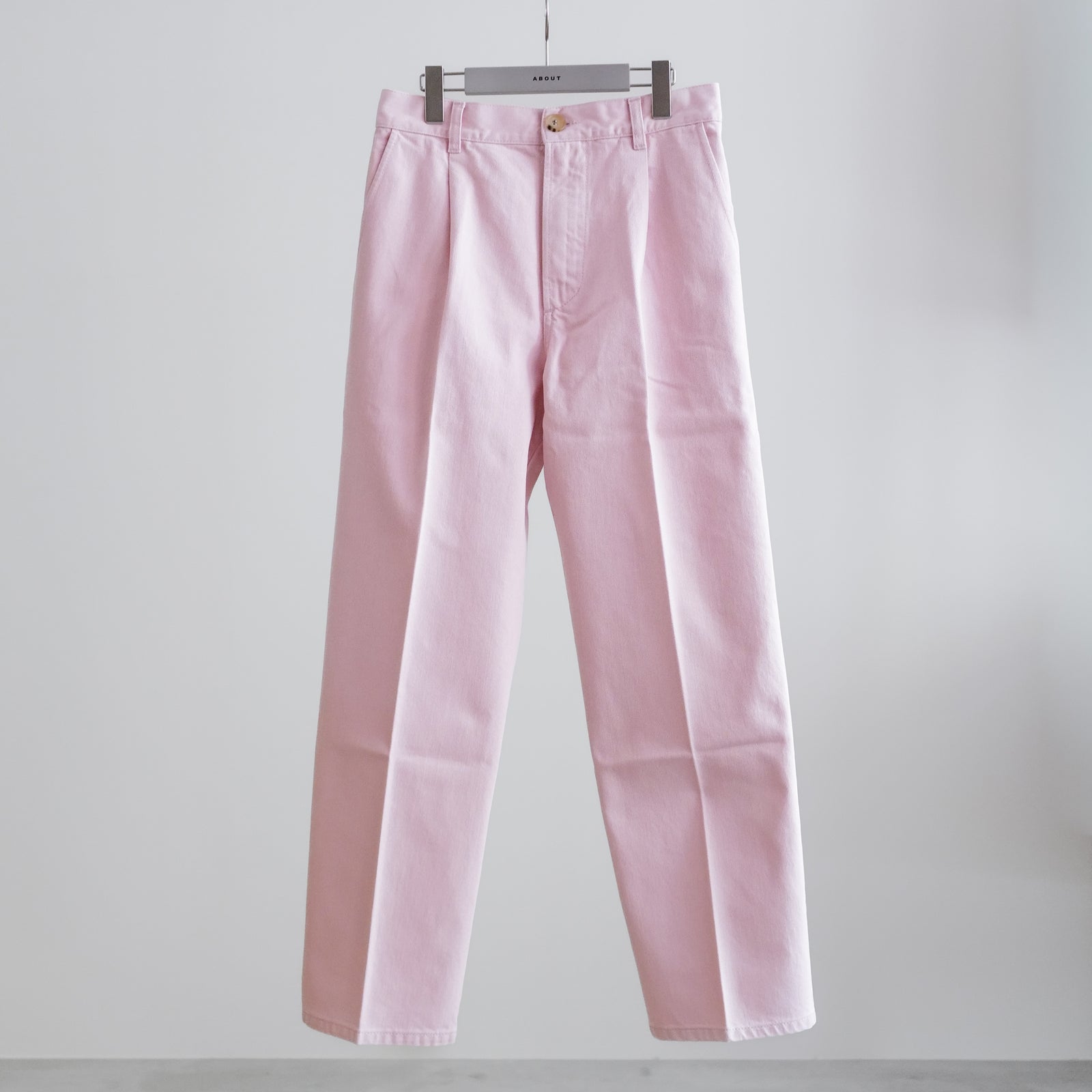 PLEATED DENIM TROUSERS – ABOUT