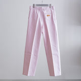 PLEATED DENIM TROUSERS
