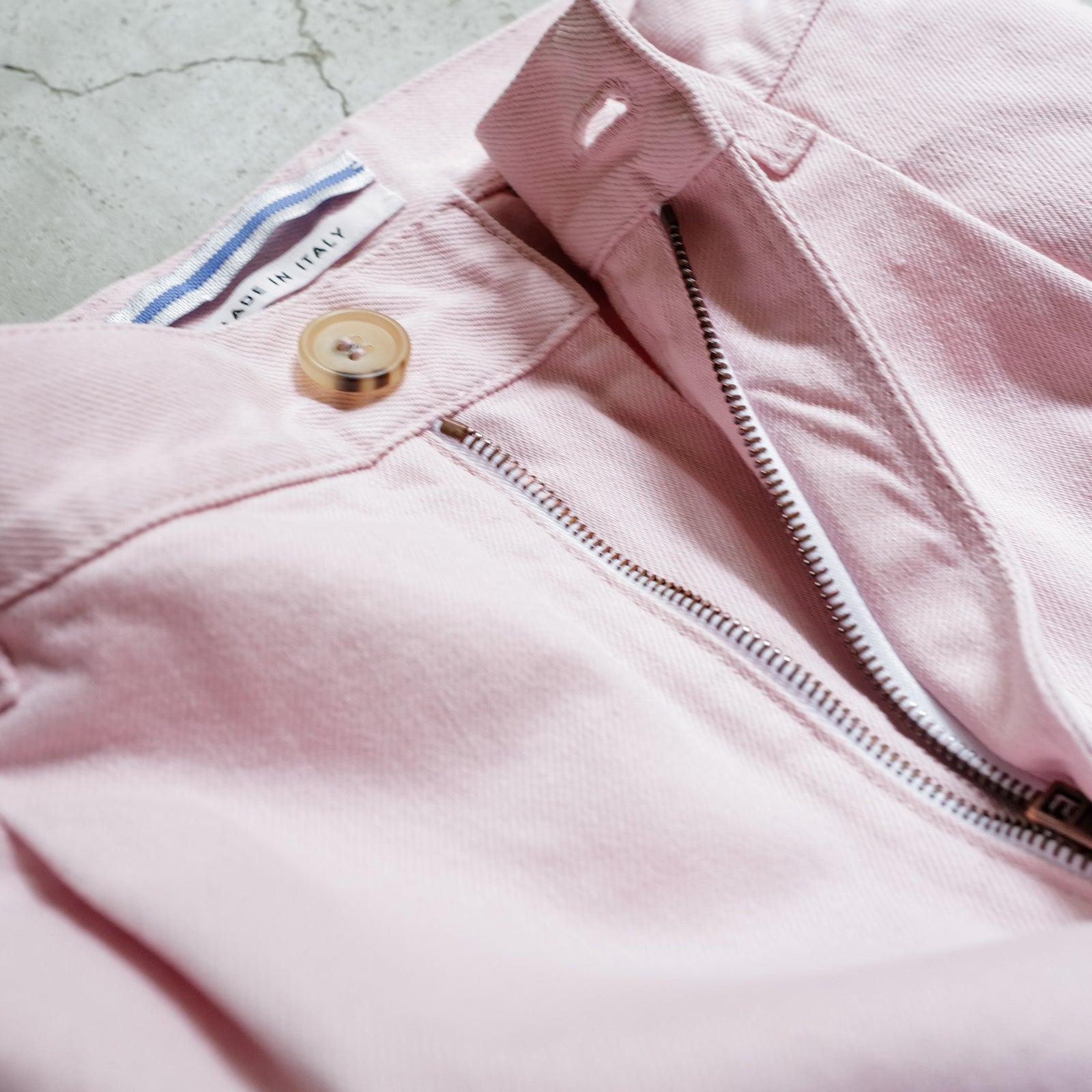PLEATED DENIM TROUSERS – ABOUT