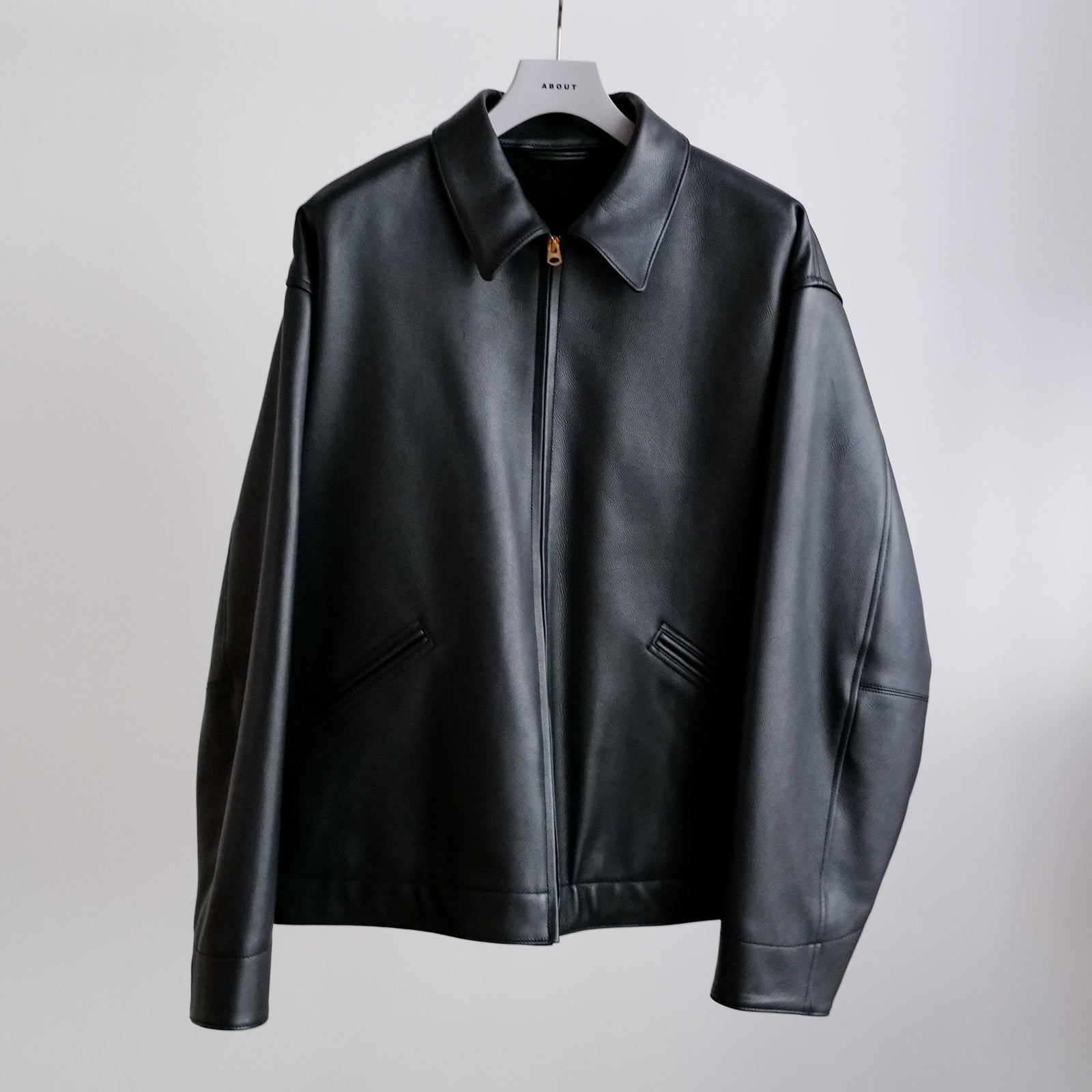 CALF SKIN ZIP SHORT JACKET – ABOUT